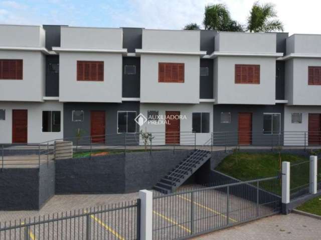 Casa em condomínio fechado com 2 quartos à venda na Rua Tapuias, 190, Santo Afonso, Novo Hamburgo, 58 m2 por R$ 235.000