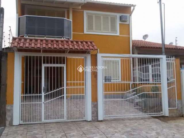 Casa com 3 quartos à venda na Rua Condores, 446, Jardim Algarve, Alvorada, 119 m2 por R$ 590.000