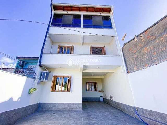 Casa com 3 quartos à venda na Rua Antonio Pedro Baldasso, 69, Rubem Berta, Porto Alegre, 191 m2 por R$ 479.000