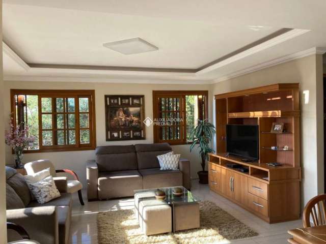 Casa com 4 quartos à venda na Rua Dolores Duran, 2306, Lomba do Pinheiro, Porto Alegre, 234 m2 por R$ 640.000