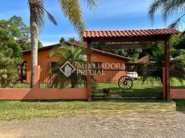 Casa em condomínio fechado com 3 quartos à venda na Rs 040, 1265, Zona Rural, Viamão, 300 m2 por R$ 600.000