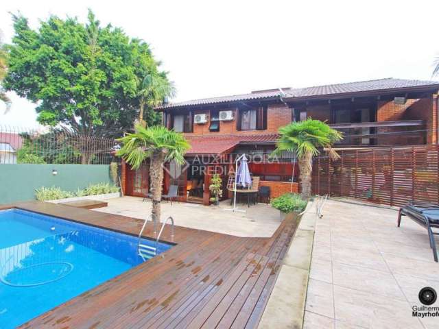 Casa em condomínio fechado com 3 quartos à venda na Rua Walir Zottis, 352, Jardim Itu Sabará, Porto Alegre, 330 m2 por R$ 1.850.000