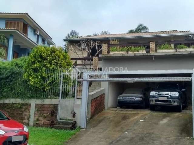 Casa em condomínio fechado com 3 quartos à venda na Rua Pinheiros, 120, São Lucas, Viamão, 223 m2 por R$ 570.000