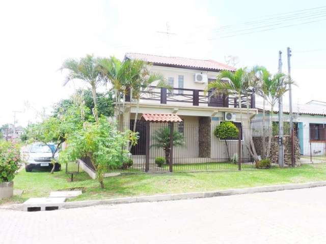 Casa em condomínio fechado com 3 quartos à venda na Rua Olavo Bilac, 245, Vacchi, Sapucaia do Sul, 130 m2 por R$ 440.000