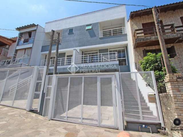 Casa em condomínio fechado com 3 quartos à venda na Rua Ivan Iglesias, 35, Jardim Itu Sabará, Porto Alegre, 213 m2 por R$ 975.000