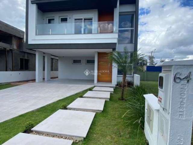Casa em condomínio fechado com 3 quartos à venda na Avenida AlphaVille, 2745, São Vicente, Gravataí, 160 m2 por R$ 1.200.000