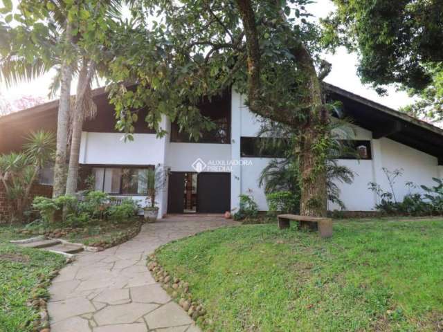 Casa com 4 quartos à venda na Rua Padre João Batista Reus, 180, Vila Conceição, Porto Alegre, 523 m2 por R$ 2.800.000