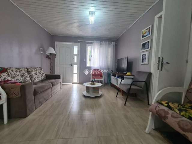 Casa com 3 quartos à venda na Rua João Vieira de Aguiar Sobrinho, 603, Belém Novo, Porto Alegre, 65 m2 por R$ 260.000