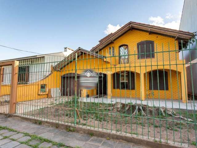 Casa com 4 quartos à venda na Rua Alfredo Silveira Dias, 169, Nonoai, Porto Alegre, 240 m2 por R$ 960.000