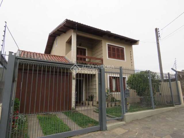 Casa em condomínio fechado com 3 quartos à venda na Rua Vladimir Herzog, 176, Jardim Carvalho, Porto Alegre, 300 m2 por R$ 700.000