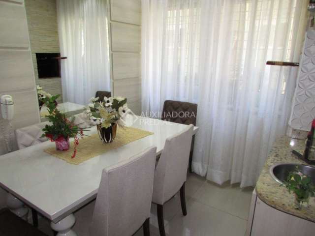 Apartamento com 3 quartos à venda na Rua Mura, 288, Guarujá, Porto Alegre, 67 m2 por R$ 235.000