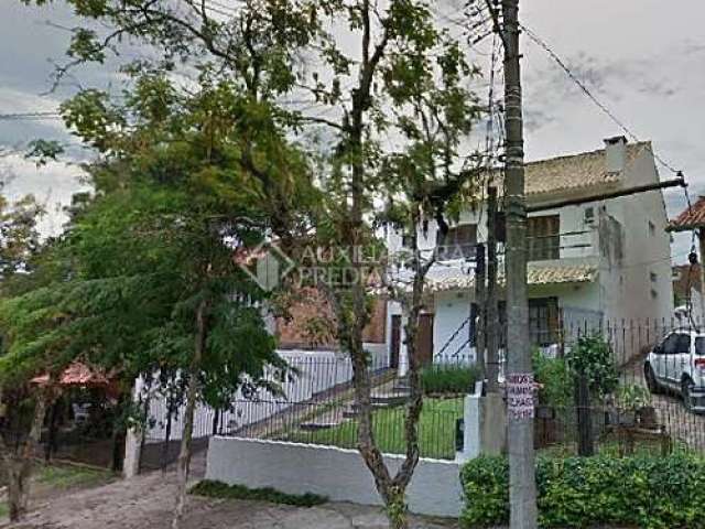Casa em condomínio fechado com 3 quartos à venda na Rua Padre Paulo Englert, 70, Espírito Santo, Porto Alegre, 190 m2 por R$ 700.000