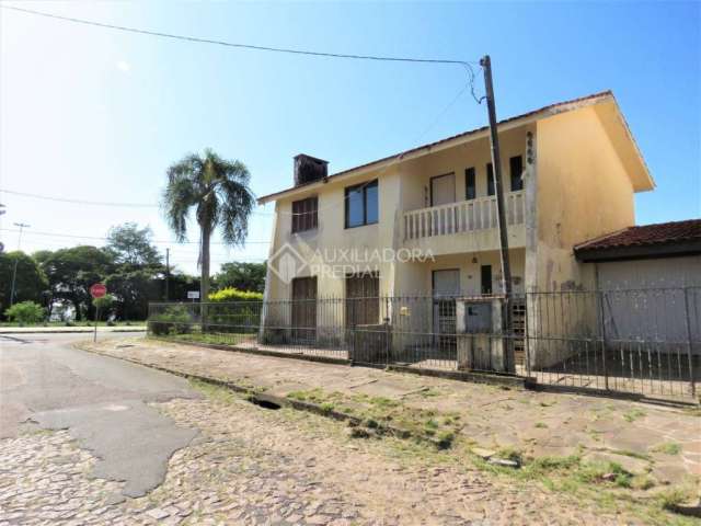Casa em condomínio fechado com 3 quartos à venda na Rua Jacipuia, 10, Guarujá, Porto Alegre, 175 m2 por R$ 640.000