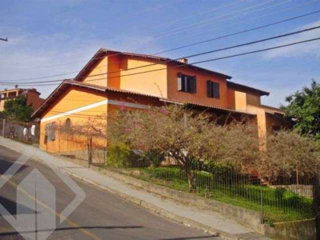 Casa em condomínio fechado com 5 quartos à venda na Rua Ângelo Passuelo, 79, Vila Nova, Porto Alegre, 215 m2 por R$ 599.000