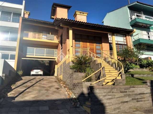 Casa em condomínio fechado com 4 quartos à venda na Rua Alcebíades Antônio dos Santos, 356, Nonoai, Porto Alegre, 495 m2 por R$ 2.500.000