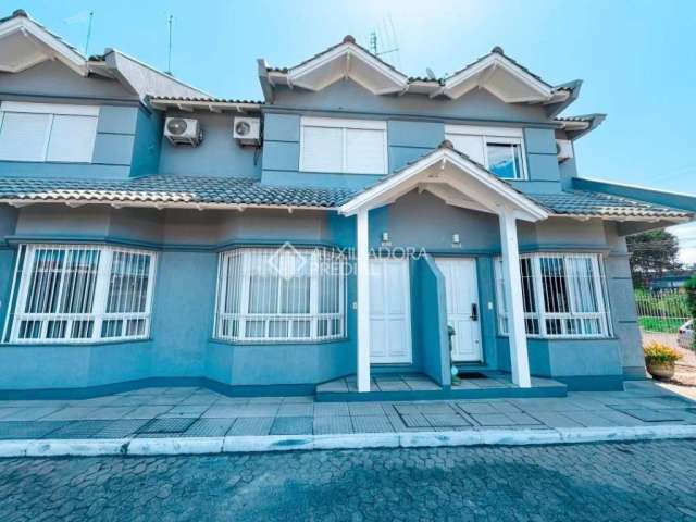 Casa em condomínio fechado com 2 quartos à venda na Rua Jorge Lacerda, 92, São José, Sapucaia do Sul, 71 m2 por R$ 370.000
