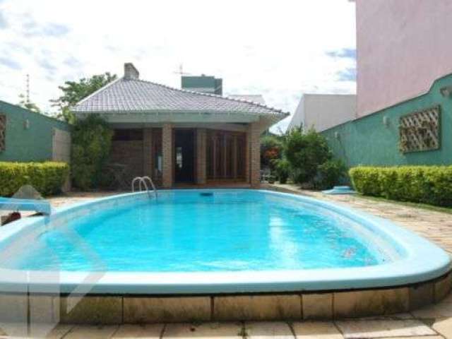 Casa em condomínio fechado com 4 quartos à venda na Rua Dulcimar Cardoso, 340, Paraíso, Sapucaia do Sul, 340 m2 por R$ 1.150.000