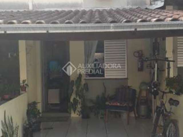 Casa em condomínio fechado com 2 quartos à venda na Avenida Feitoria, 3535, Feitoria, São Leopoldo, 46 m2 por R$ 149.000