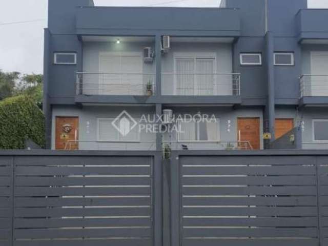 Casa em condomínio fechado com 3 quartos à venda na Rua Balduino Weber, 357, Feitoria, São Leopoldo, 125 m2 por R$ 495.000