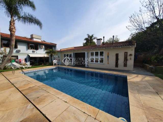 Casa em condomínio fechado com 4 quartos à venda na Travessa Pedra Redonda, 130, Jardim Isabel, Porto Alegre, 500 m2 por R$ 2.200.000