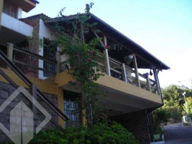 Casa com 4 quartos à venda na Acesso Hélio Alves da Rocha, 85, Vila Nova, Porto Alegre, 450 m2 por R$ 2.500.000