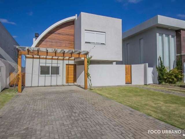 Casa em condomínio fechado com 4 quartos à venda na Avenida Juca Batista, 9000, Belém Novo, Porto Alegre, 290 m2 por R$ 1.820.000