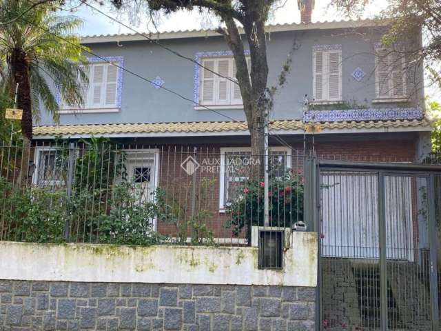 Casa com 4 quartos à venda na Rua Guaraum, 112, Vila Assunção, Porto Alegre, 257 m2 por R$ 1.065.000
