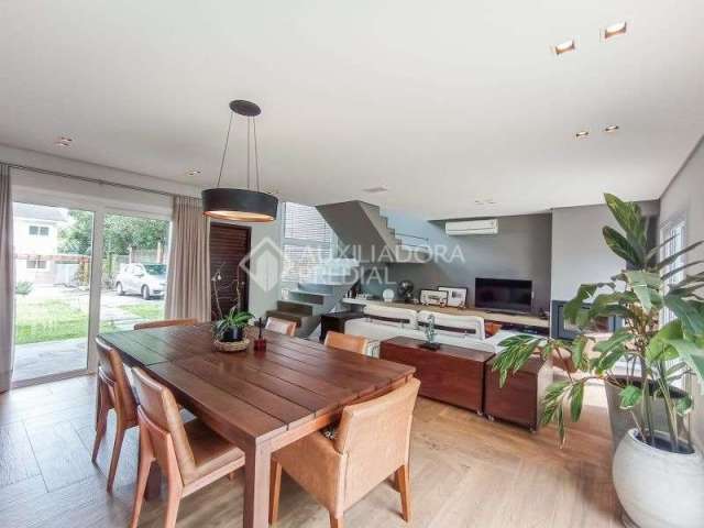 Casa em condomínio fechado com 3 quartos à venda na Rua Francisco Solano Borges, 200, Hípica, Porto Alegre, 174 m2 por R$ 1.065.000