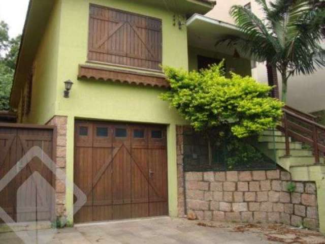 Casa em condomínio fechado com 3 quartos à venda na Rua Cangussu, 58, Nonoai, Porto Alegre, 160 m2 por R$ 514.000