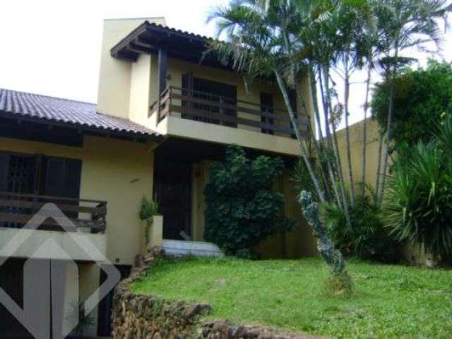 Casa em condomínio fechado com 4 quartos à venda na Rua Jataí, 670, Cristal, Porto Alegre, 378 m2 por R$ 1.395.000