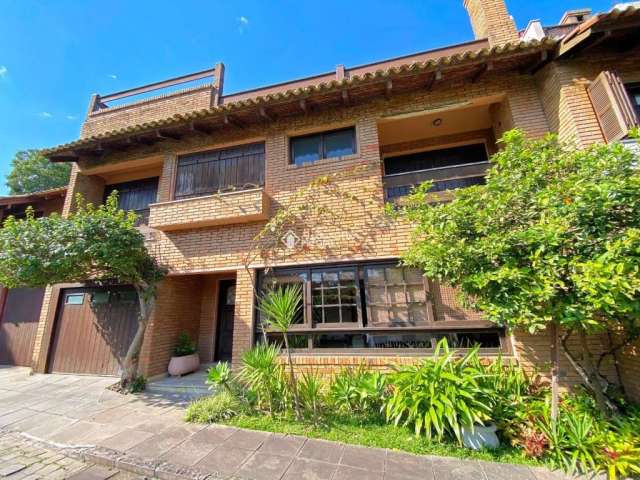Casa em condomínio fechado com 3 quartos à venda na Rua Carlos Júlio Becker, 295, Tristeza, Porto Alegre, 331 m2 por R$ 1.280.000
