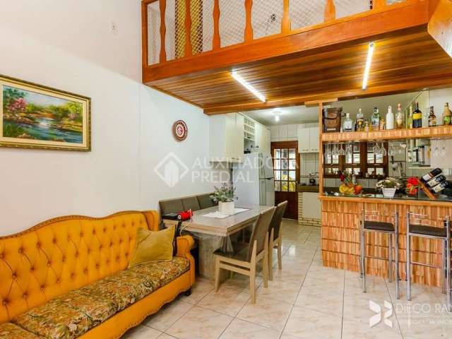 Casa em condomínio fechado com 2 quartos à venda na Rua Álamo-Branco, 45, Restinga, Porto Alegre, 136 m2 por R$ 307.400