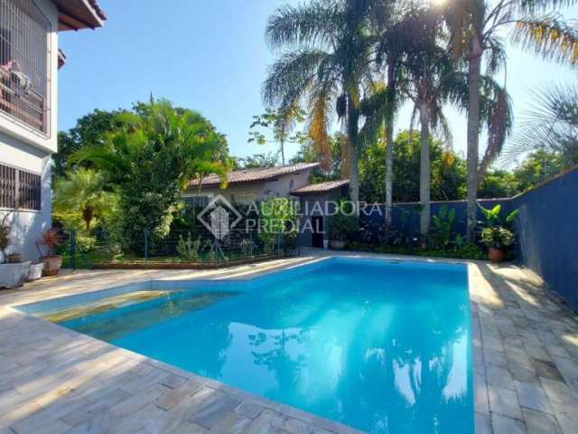 Casa com 4 quartos à venda na Rua Lúcio Vitorino de Souza, 244, Santa Mônica, Florianópolis, 460 m2 por R$ 2.399.000