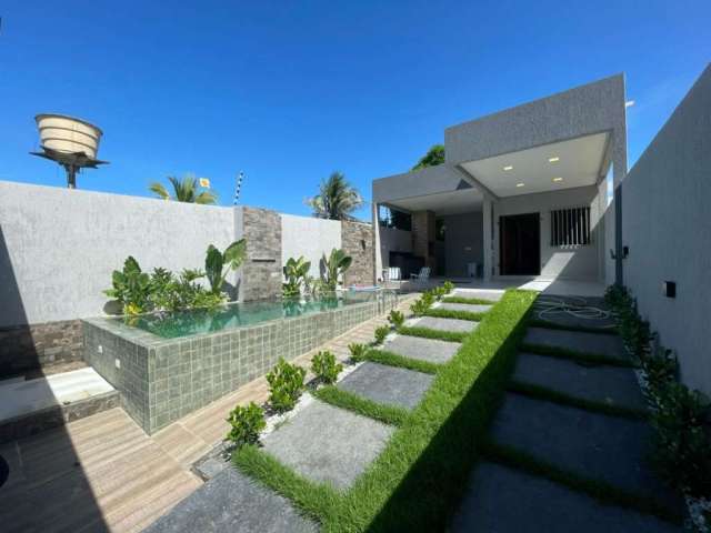 Casa com 3 dormitórios à venda, 140 m² por R$ 570.000 - Carapibus - Conde/PB