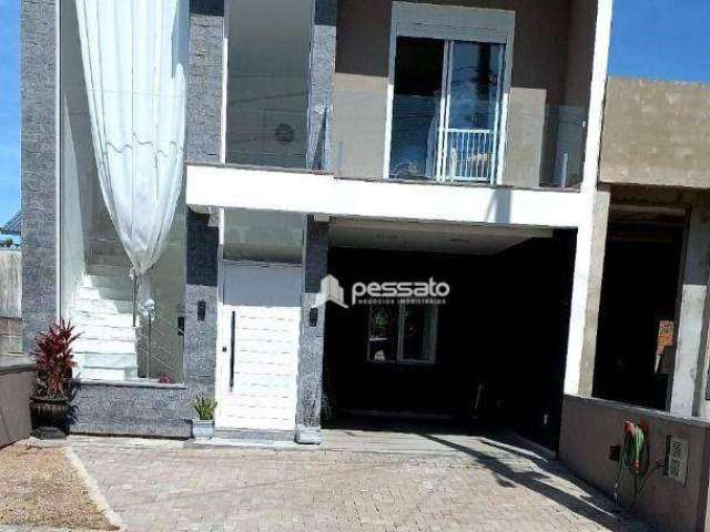 Sobrado com 3 dormitórios à venda, 122 m² por R$ 650.000,00 - Caça e Pesca - Gravataí/RS