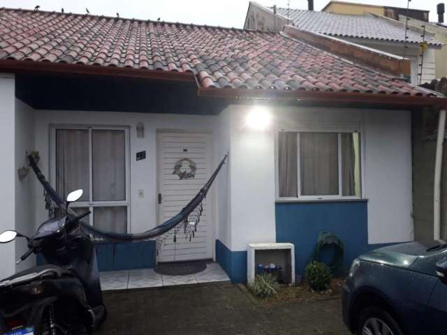 Casa em condomínio fechado com 2 quartos à venda na Avenida do Nazario, 1200, Olaria, Canoas, 53 m2 por R$ 212.000