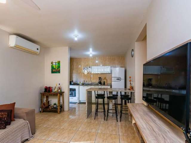 Casa em condomínio fechado com 2 quartos à venda na Rua Dezoito, 376, Olaria, Canoas, 54 m2 por R$ 290.000