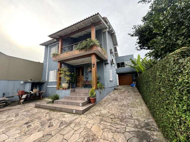 Casa com 3 quartos à venda na Rua Tomé de Souza, 556, Nossa Senhora das Graças, Canoas, 320 m2 por R$ 1.600.000