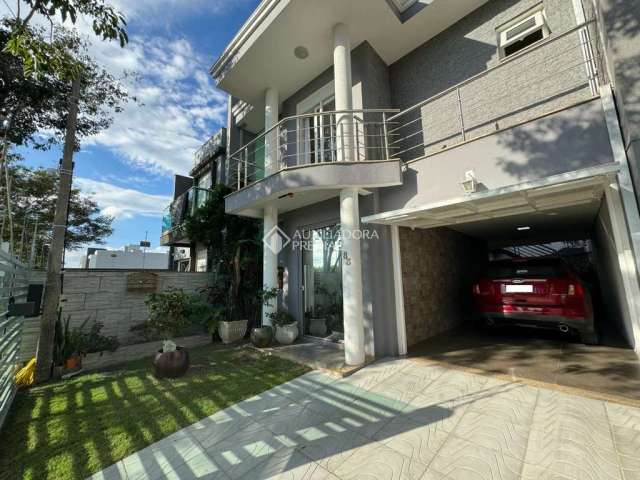 Casa com 3 quartos à venda na Rua Luis Alberto Ribeiro de Castro, 83, Estância Velha, Canoas, 177 m2 por R$ 900.000