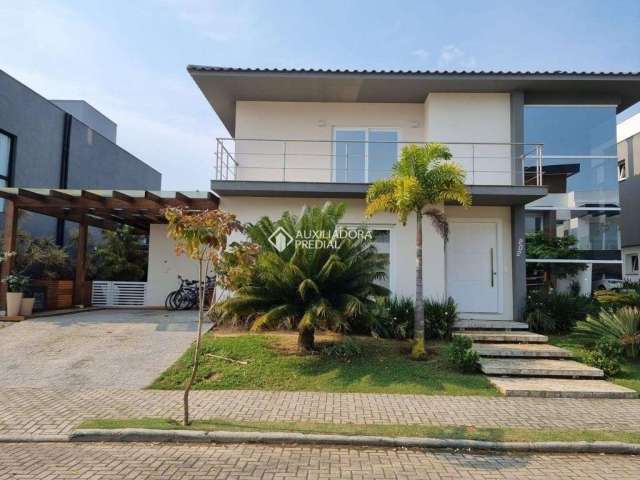Casa em condomínio fechado com 3 quartos à venda na Rodovia Doutor Antônio Luiz Moura Gonzaga, 3825, Rio Tavares, Florianópolis, 310 m2 por R$ 6.360.000