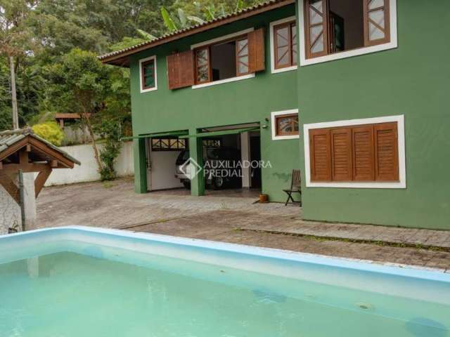 Casa com 4 quartos à venda na Servidão Recanto da Pedra, 3, Rio Tavares, Florianópolis, 396 m2 por R$ 1.999.000