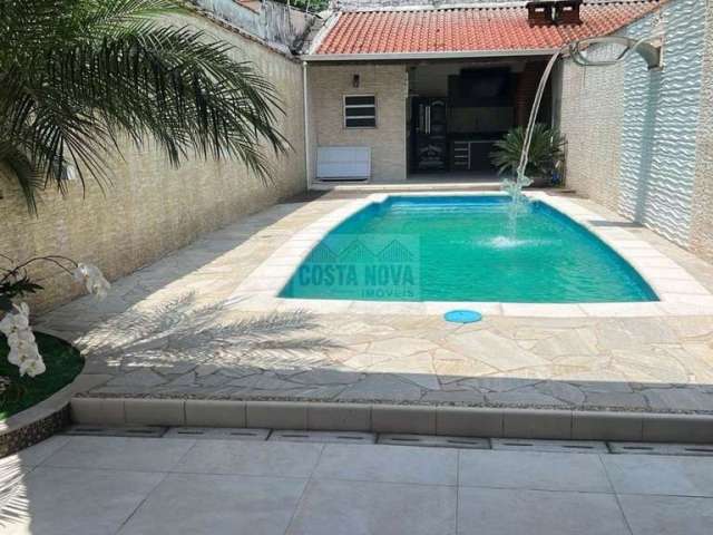 Vende se casa 4 suítes, piscina, 6 banheiros, 4 vagas, 300m² total, Guilhermina ,Praia Grande.