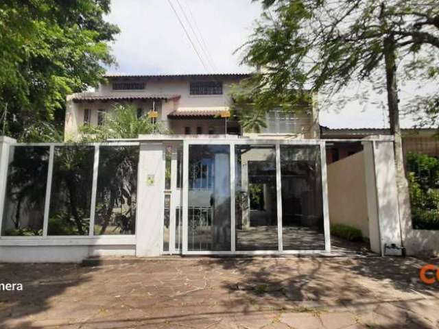 Casa com 6 dormitórios para alugar, 400 m² por R$ 7.850,00/mês - Teresópolis - Porto Alegre/RS