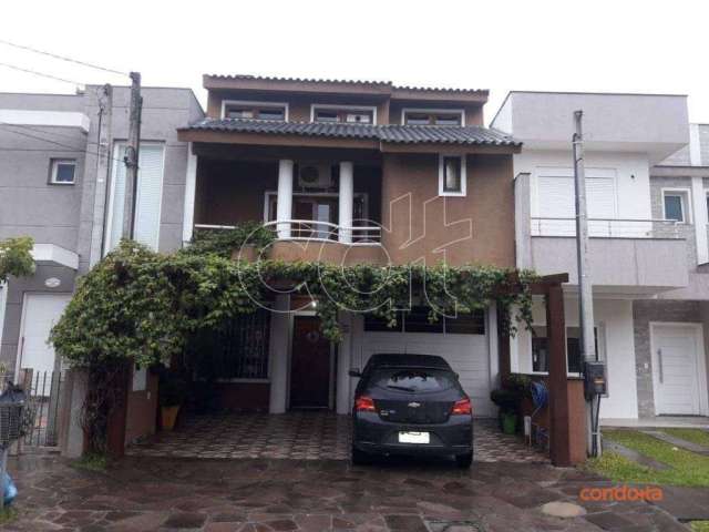 Casa com 3 dormitórios para alugar, 217 m² por R$ 4.691,84/mês - Hípica - Porto Alegre/RS