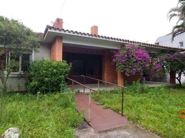 Casa com 4 dormitórios para alugar, 282 m² por R$ 8.380,00/mês - Vila Assunção - Porto Alegre/RS