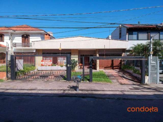 Casa com 4 dormitórios para alugar, 300 m² por R$ 7.120,67/mês - Pedra Redonda - Porto Alegre/RS
