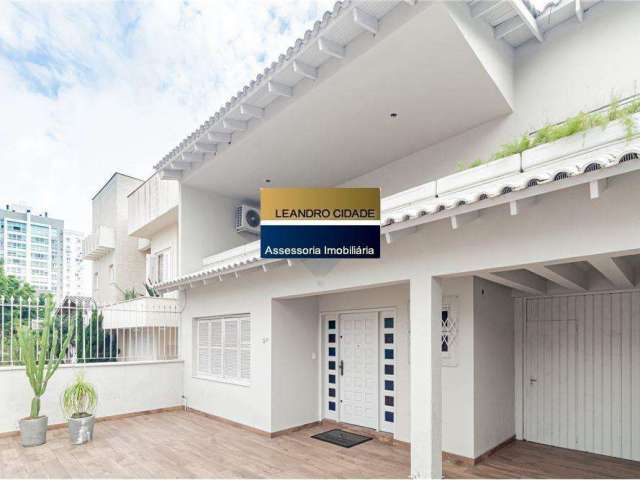 Casa 3 dormitórios à venda no Bairro Passo da Areia com 312 m² de área privativa - 6 vagas de garagem
