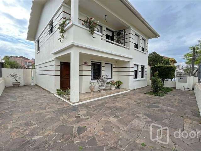 Casa com 4 quartos à venda na Rua Evaristo da Veiga, 226, Partenon, Porto Alegre, 271 m2 por R$ 1.150.000