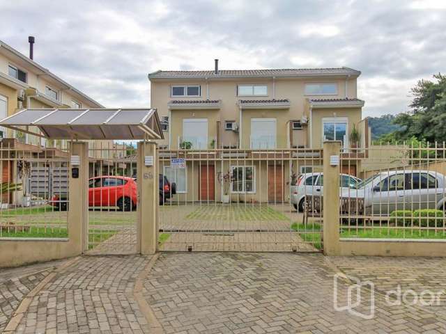 Casa em condomínio fechado com 2 quartos à venda na Rua José Pereira da Cunha, 68, Vila Nova, Porto Alegre, 93 m2 por R$ 390.000