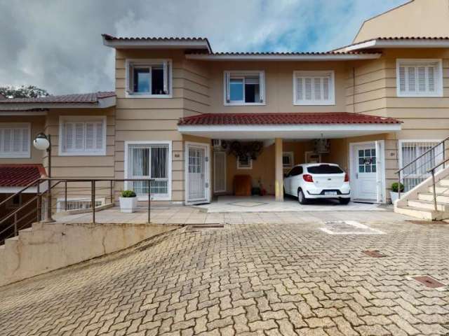 Casa em condomínio fechado com 3 quartos à venda na Rua Costa Lima, 564, Nonoai, Porto Alegre, 134 m2 por R$ 699.000